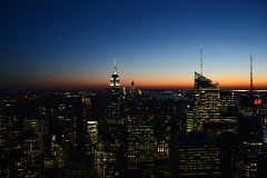 New York City Top Of The Rock 14C South Midtown To Empire State Building To World Trade Center Financial District, Bank of America Tower After Sunset.jpg